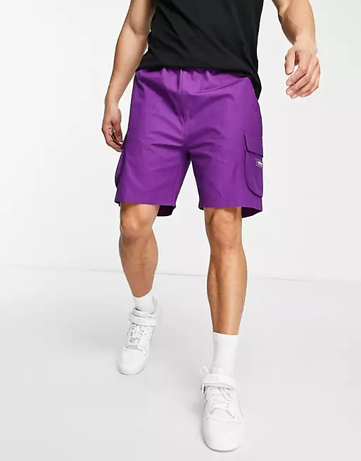 Men's purple shorts can be a versatile and stylish addition to your wardrobe. The vibrant color offers a unique and eye-catching