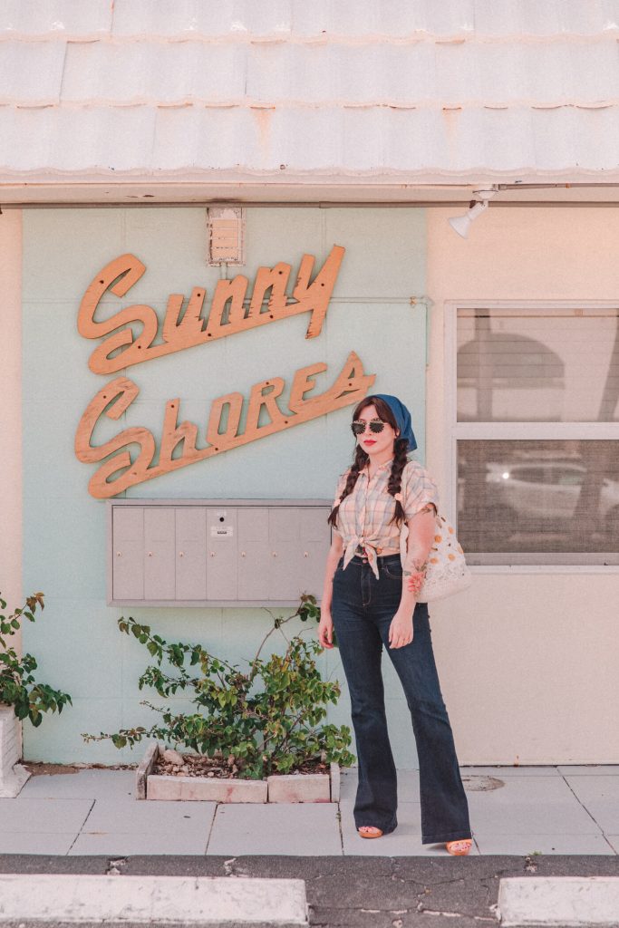 Bell bottom jeans outfit have made a significant comeback in recent years, offering a nostalgic nod to the fashion of the 1960s and 70s while