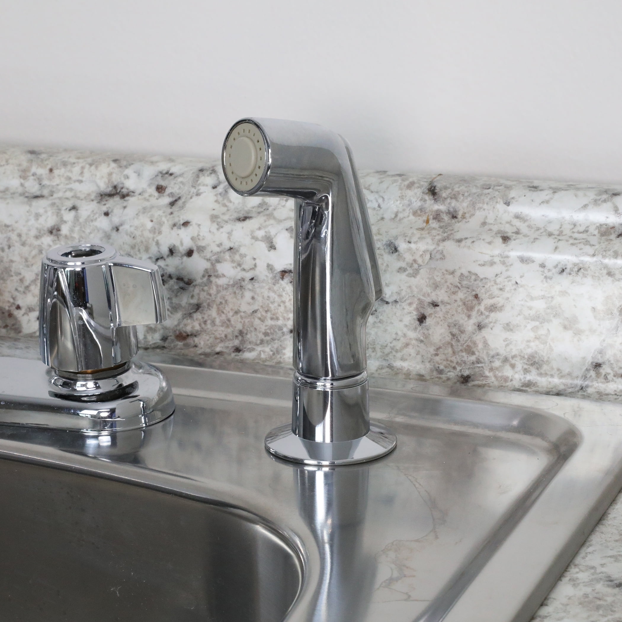sink sprayer stuck on
