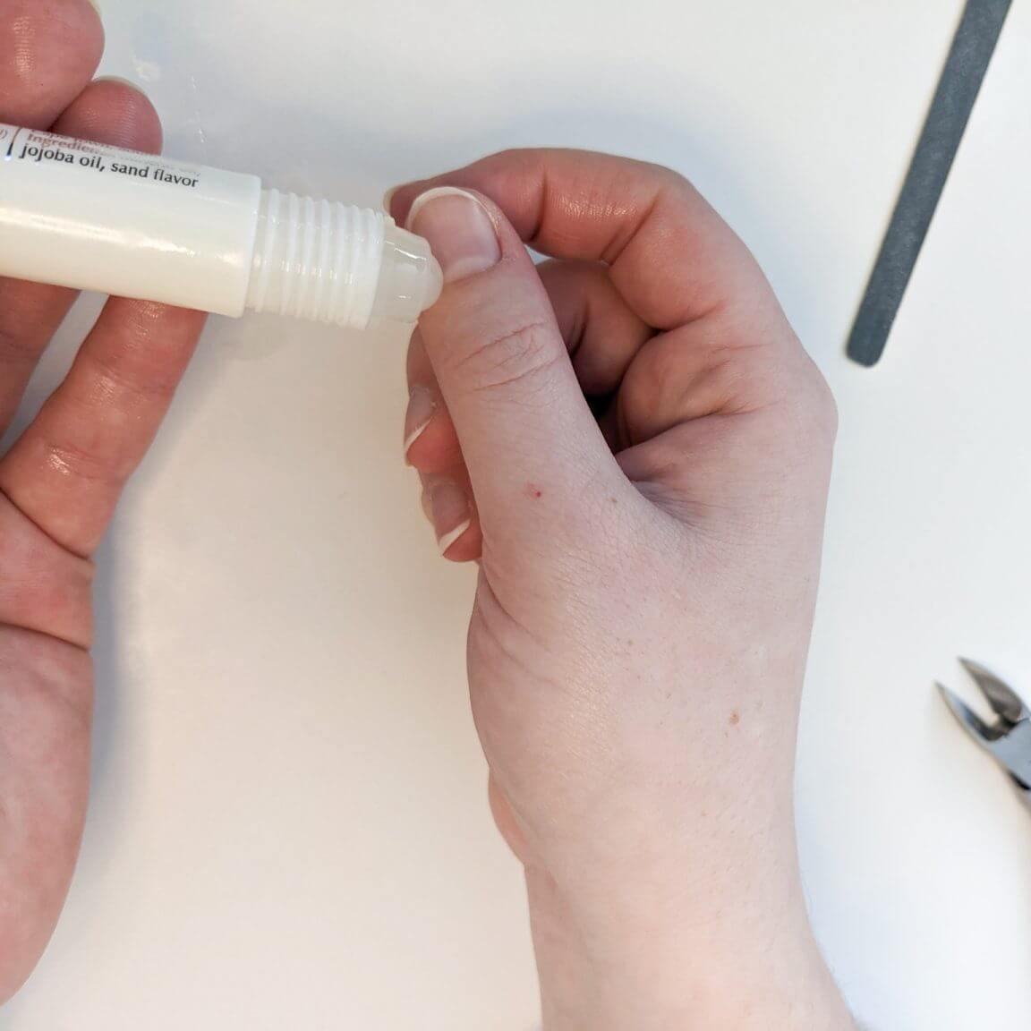 get nail glue off