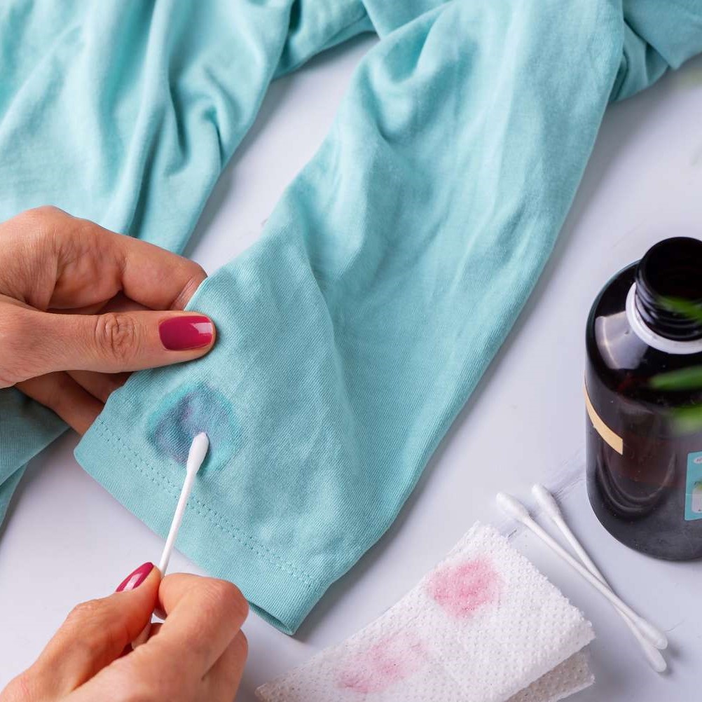 get nail glue out of clothes