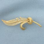 feather brooch pin