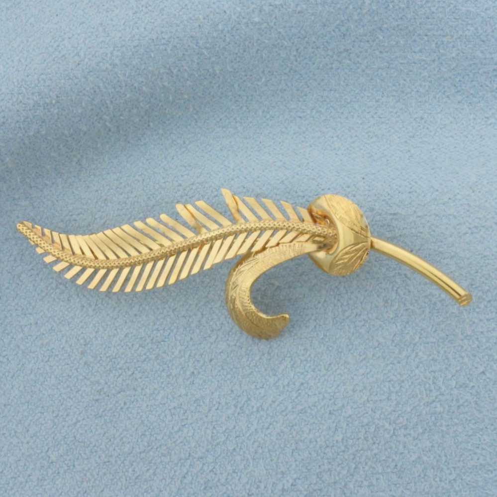 feather brooch pin